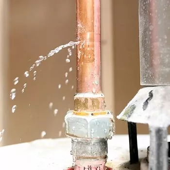 https://images0.plumbersstock.com/350/350/content/fixing-a-leaking-water-heater-350x350.webp