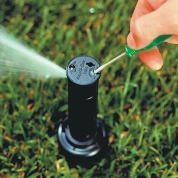 adjusting a sprinkler head