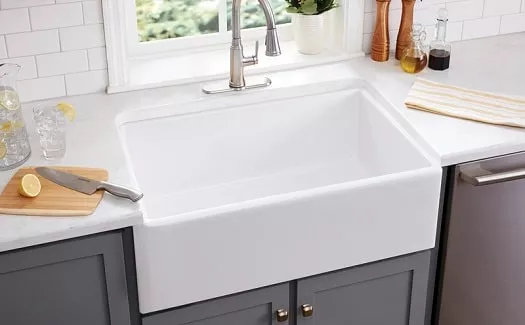 apron front sink is a farmhouse with an exposed front