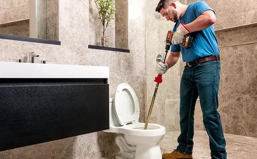 how to use a toilet auger
