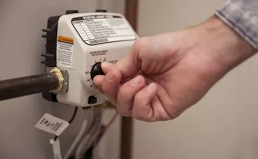 turning on an electric water heater