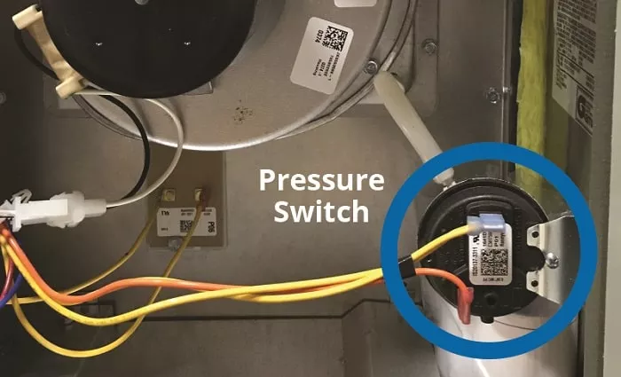 where the pressure switch on a furnace is located