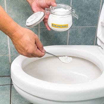 unclogging a toilet with baking soda